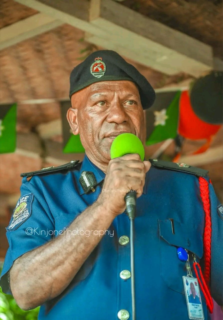 Uniformed officer speaking at the event